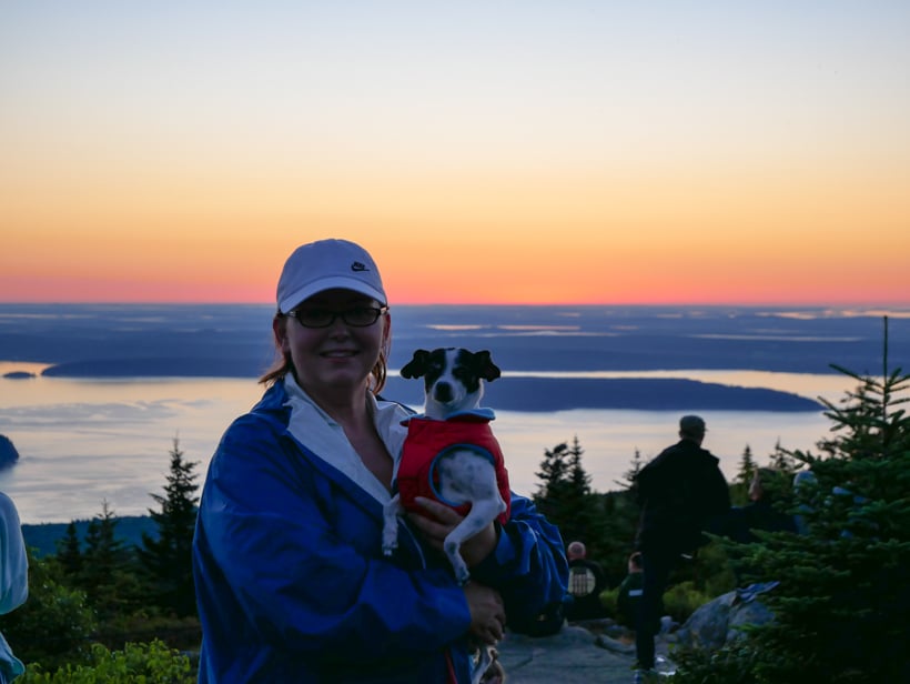 We're both in jackets to keep warm as we watch the Cadillac Mountain sunrise during the summer.