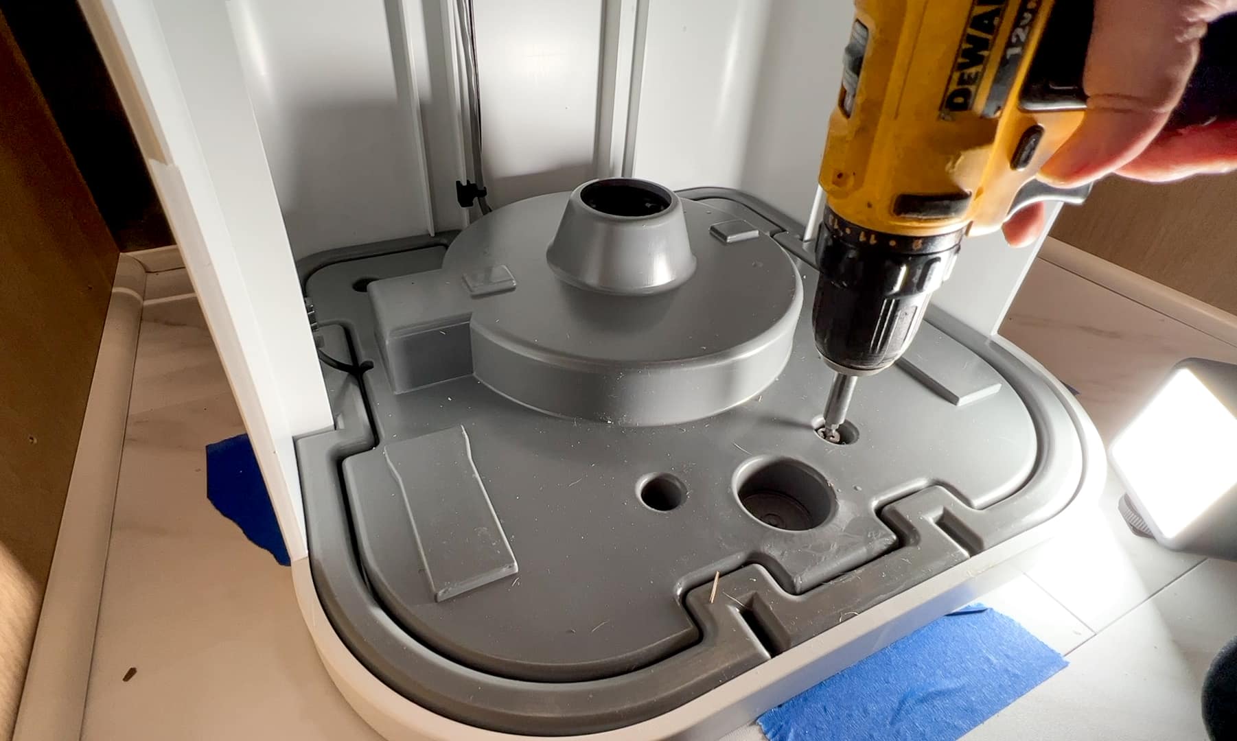 OGO Composting Toilet Installation to Floor mounting with screws and drill